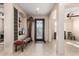 Bright entryway with tile floors, decorative accents, and a bench at 44429 N 1St Dr, New River, AZ 85087