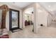 Bright entryway with tile floors, decorative accents, and a bench at 44429 N 1St Dr, New River, AZ 85087