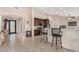 Modern kitchen with dark wood cabinets and granite counters at 44429 N 1St Dr, New River, AZ 85087