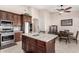 Kitchen with island, stainless steel appliances, and breakfast nook at 44429 N 1St Dr, New River, AZ 85087