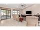 Relaxing living room featuring recessed lighting and sliding glass doors at 44429 N 1St Dr, New River, AZ 85087