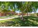 A common area offers a putting green, benches, and walking paths for homeowners to enjoy at 4511 W Valencia Dr, Laveen, AZ 85339