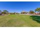 Neighborhood park featuring shaded playground, picnic tables, and well-maintained green space at 4511 W Valencia Dr, Laveen, AZ 85339