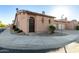 Charming single-story home featuring desert landscaping, tile roof, private drive, and an attached two-car garage at 4511 W Valencia Dr, Laveen, AZ 85339