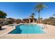 Sparkling community pool with spa and a charming ramada in the background at 4511 W Valencia Dr, Laveen, AZ 85339