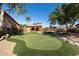 Residents can practice their putting in this community space with an immaculate green at 4511 W Valencia Dr, Laveen, AZ 85339