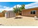 Large backyard with storage shed and gravel at 4543 W Lane Ave, Glendale, AZ 85301