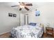 Cozy bedroom with ceiling fan and access to backyard at 4543 W Lane Ave, Glendale, AZ 85301