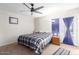 Spacious bedroom with a comfortable bed and plenty of natural light at 4543 W Lane Ave, Glendale, AZ 85301