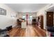 Living room with hardwood floors and built-in shelving at 4543 W Lane Ave, Glendale, AZ 85301