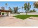 Landscaped backyard with pool and grass at 4622 E Palo Verde Dr, Phoenix, AZ 85018