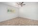 Spacious bedroom with hardwood floors and ceiling fan at 4622 E Palo Verde Dr, Phoenix, AZ 85018