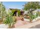 Welcoming entryway with a stone path and lush landscaping at 4622 E Palo Verde Dr, Phoenix, AZ 85018