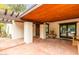 Covered patio with terracotta tile flooring and fountain at 4622 E Palo Verde Dr, Phoenix, AZ 85018