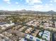 Aerial view of community near mountains, showcasing homes and landscape at 5330 N Central Ave # 3, Phoenix, AZ 85012