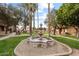 Relaxing courtyard with a water fountain and lush landscaping at 5330 N Central Ave # 3, Phoenix, AZ 85012