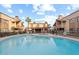 Inviting community pool with a hot tub and surrounding patio at 5330 N Central Ave # 3, Phoenix, AZ 85012