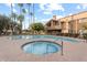 Community pool and spa with surrounding patio and landscaping at 5330 N Central Ave # 3, Phoenix, AZ 85012