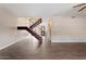 Modern staircase with dark wood accents at 5330 N Central Ave # 3, Phoenix, AZ 85012