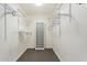 Spacious walk-in closet with shelves and hanging rods at 5330 N Central Ave # 3, Phoenix, AZ 85012