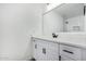 Bathroom boasts white vanity, quartz countertop, and modern fixtures at 5919 S Lakeshore Dr, Tempe, AZ 85283