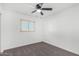 Bright bedroom with ceiling fan and carpet flooring at 5919 S Lakeshore Dr, Tempe, AZ 85283