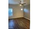 Spacious bedroom with hardwood floors and ceiling fan at 600 W Grove Pkwy # 2067, Tempe, AZ 85283