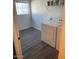 Laundry room with washer, dryer, and shelving at 600 W Grove Pkwy # 2067, Tempe, AZ 85283