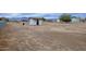 Large backyard with shed and distant mountain views at 6118 N 183Rd Ave, Waddell, AZ 85355