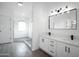 Double vanity bathroom with large walk in shower at 6118 N 183Rd Ave, Waddell, AZ 85355