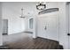 Elegant entryway with tile floors and double doors at 6118 N 183Rd Ave, Waddell, AZ 85355