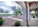 Landscaped front yard with walkway and desert landscaping at 6118 N 183Rd Ave, Waddell, AZ 85355