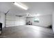 Spacious garage with high ceilings and plenty of room for storage at 6118 N 183Rd Ave, Waddell, AZ 85355