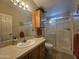 Clean bathroom with a shower/tub combo, vanity, and mirror at 650 N Hawes Rd # 4820, Mesa, AZ 85207