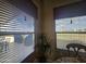 View from dining area showcasing a patio and landscape at 650 N Hawes Rd # 4820, Mesa, AZ 85207