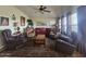 Comfortable living room with leather furniture and warm decor at 650 N Hawes Rd # 4820, Mesa, AZ 85207