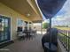 Outdoor patio with table, chairs, and grill at 650 N Hawes Rd # 4820, Mesa, AZ 85207