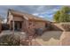 Landscaped backyard with gravel and a patio at 6610 E University Dr # 157, Mesa, AZ 85205