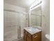 Clean bathroom with marble countertop and a shower at 6610 E University Dr # 157, Mesa, AZ 85205