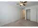 Bedroom with closet and ceiling fan at 6610 E University Dr # 157, Mesa, AZ 85205