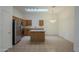 Bright kitchen features an island and stainless steel appliances at 6610 E University Dr # 157, Mesa, AZ 85205