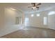 Bright living room with tile floors and ceiling fan at 6610 E University Dr # 157, Mesa, AZ 85205