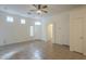 Spacious living room with tile floors and ceiling fan at 6610 E University Dr # 157, Mesa, AZ 85205