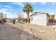 Large backyard with gravel, stone path, and storage shed at 6725 E Moreland St, Scottsdale, AZ 85257