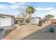 Spacious backyard, patio furniture, fire pit, and palm trees at 6725 E Moreland St, Scottsdale, AZ 85257