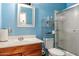 Bathroom with shower/tub combo, vanity, and shelving at 6725 E Moreland St, Scottsdale, AZ 85257