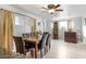 Bright dining area with a table for six and ceiling fan at 6725 E Moreland St, Scottsdale, AZ 85257