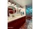 Bathroom featuring dual sinks, modern fixtures, and an enclosed tile shower at 7777 E 2Nd St # 101, Scottsdale, AZ 85251