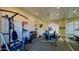 Well-equipped gym with exercise machines, free weights, and mirrored wall at 7777 E 2Nd St # 101, Scottsdale, AZ 85251