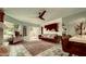 Bright living room with fireplace, ceiling fan, sliding doors and brown velvet couch at 7777 E 2Nd St # 101, Scottsdale, AZ 85251